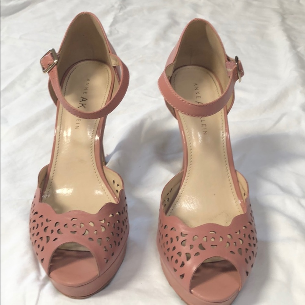 Peep toe pink eyelet pumps